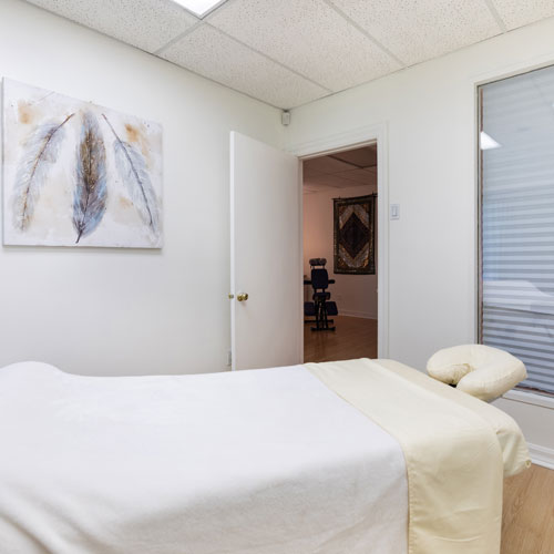 massage therapist room with massage table